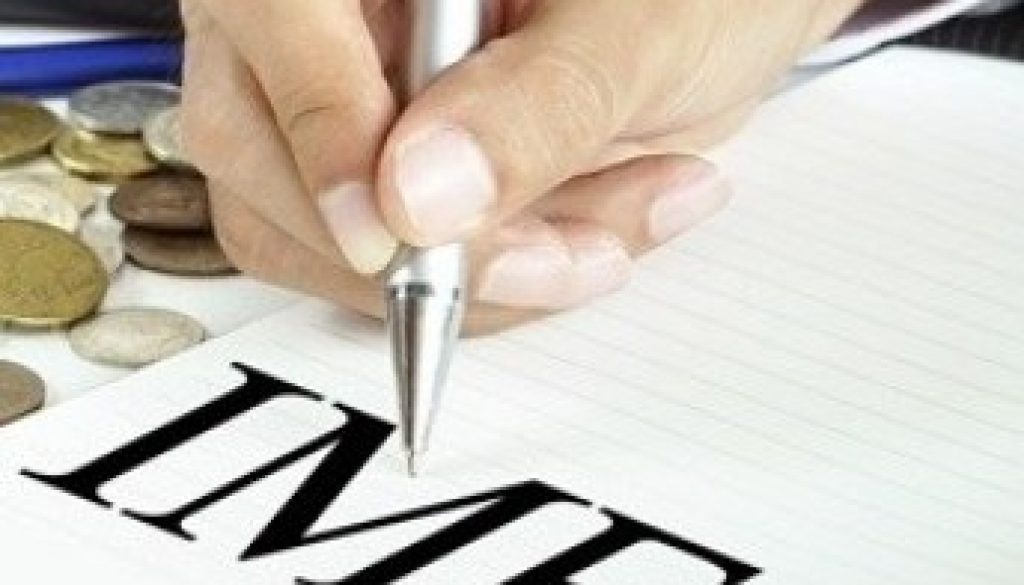 IMF (International Monetary Fund) sign on the paper