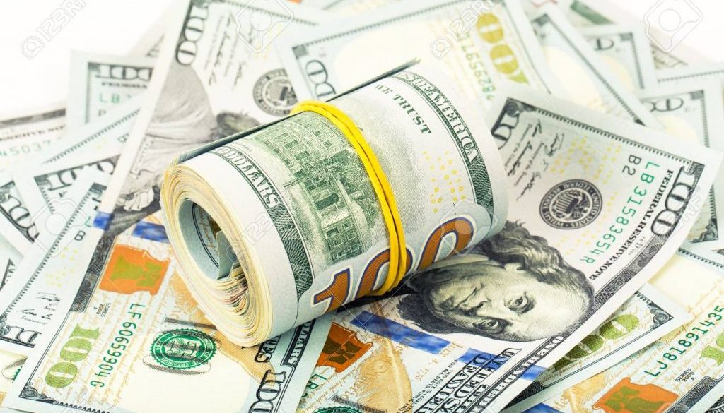roll of dollars on money background