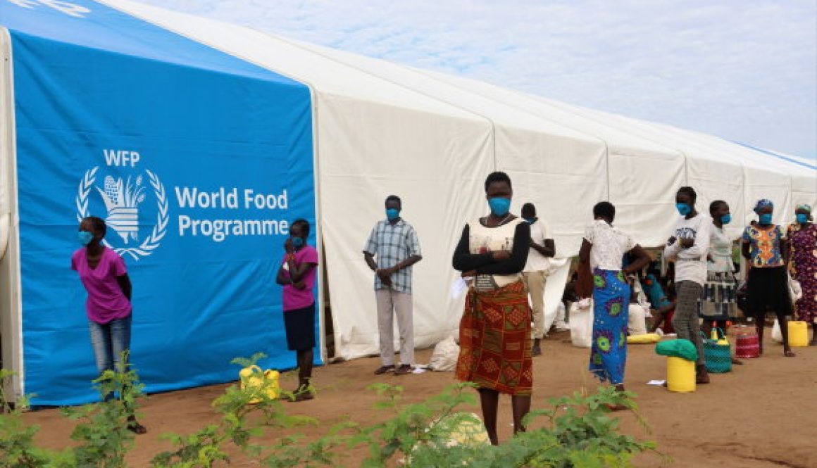 Refugees wait to collect food at a centre in Kakuma camps_Courtesy-WFP (003)